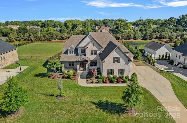 409 Wheatberry Hill Dr, Matthews, NC 28104 - view of front of home featuring concrete driveway and brick siding