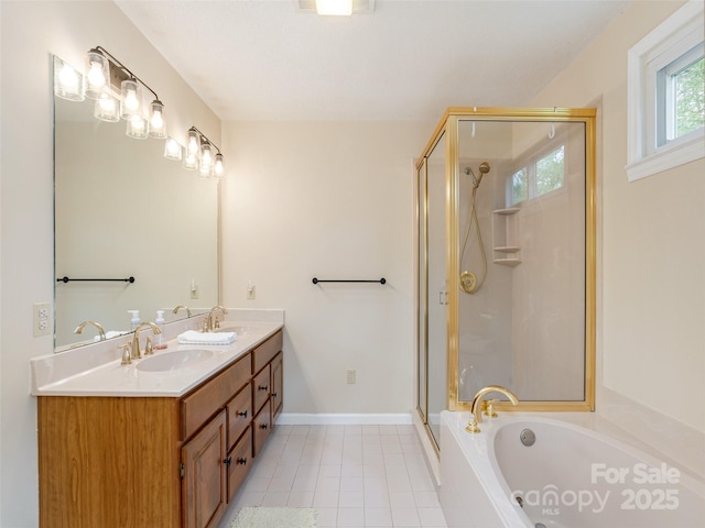 bathroom with a shower stall, a garden tub, double vanity, and tile patterned floors