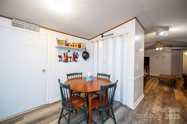 475 Dot Faris Rd, Catawba, SC 29704 - dining room featuring wood finished floors, a textured ceiling, ceiling fan, and vaulted ceiling
