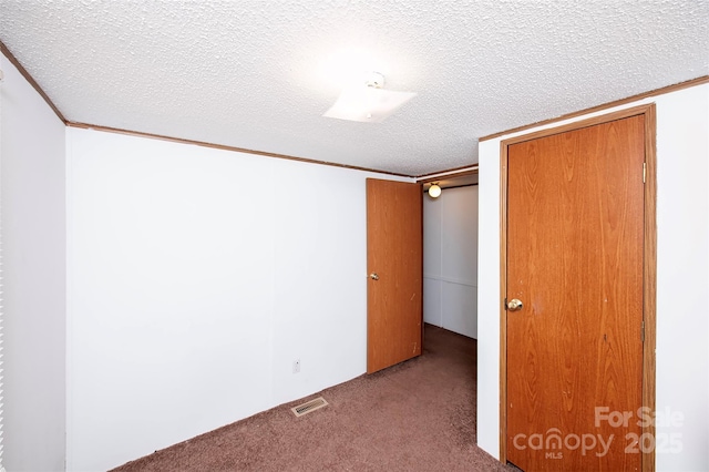 475 Dot Faris Rd, Catawba, SC 29704 - unfurnished bedroom with carpet floors, a textured ceiling, and crown molding