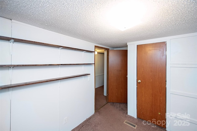 475 Dot Faris Rd, Catawba, SC 29704 - unfurnished bedroom with carpet floors and a textured ceiling
