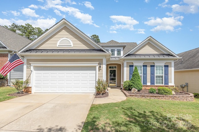 2035 Moultrie Ct, Fort Mill, SC 29707 - view of front of home with a standing seam roof, concrete driveway, a front lawn, metal roof, and an attached garage