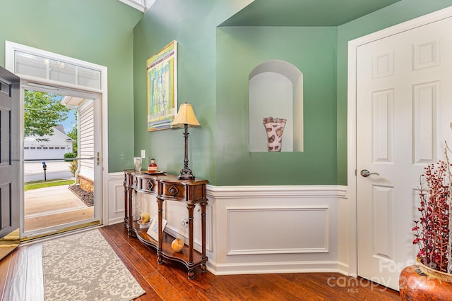 2035 Moultrie Ct, Fort Mill, SC 29707 - foyer entrance with wainscoting, dark wood-type flooring, and a decorative wall