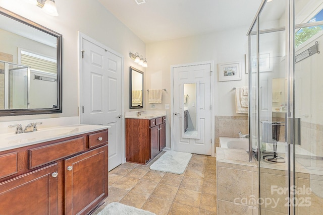 2035 Moultrie Ct, Fort Mill, SC 29707 - full bath featuring a shower stall, two vanities, and a bath