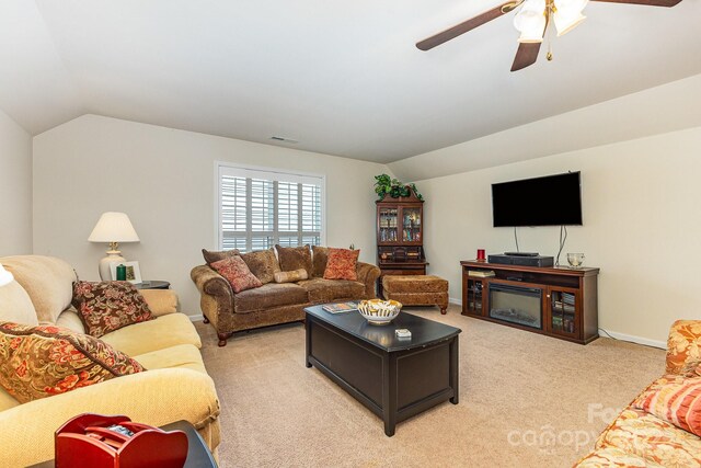 2035 Moultrie Ct, Fort Mill, SC 29707 - living area featuring vaulted ceiling, a ceiling fan, light carpet, and baseboards