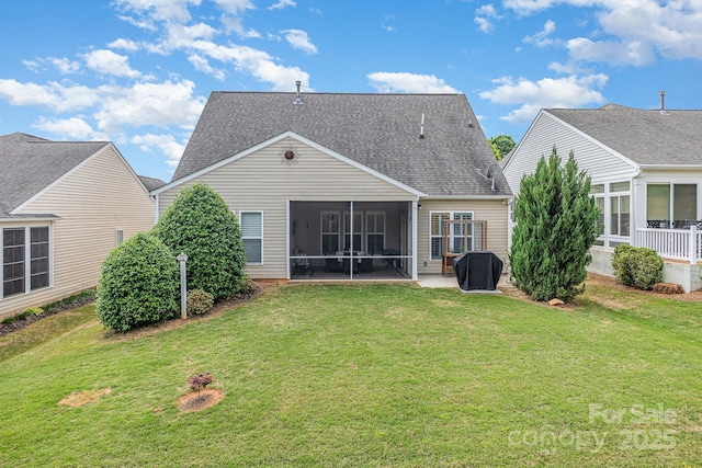 2035 Moultrie Ct, Fort Mill, SC 29707 - back of house with a sunroom, roof with shingles, and a lawn
