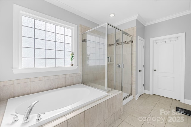 bathroom with a shower stall, ornamental molding, a garden tub, tile patterned flooring, and baseboards