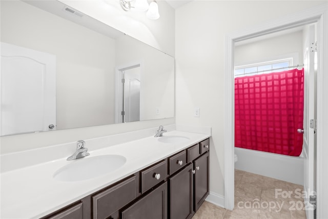 bathroom with double vanity, toilet, and shower / bathtub combination with curtain