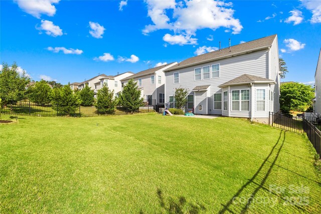 back of property featuring a residential view