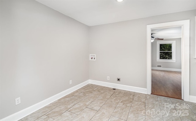 506 7th St SW, Hickory, NC 28602 - laundry room with washer hookup, hookup for an electric dryer, baseboards, and ceiling fan