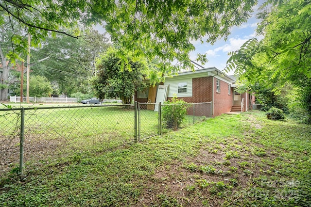 506 7th St SW, Hickory, NC 28602 - view of yard with a gate, central air condition unit, and entry steps