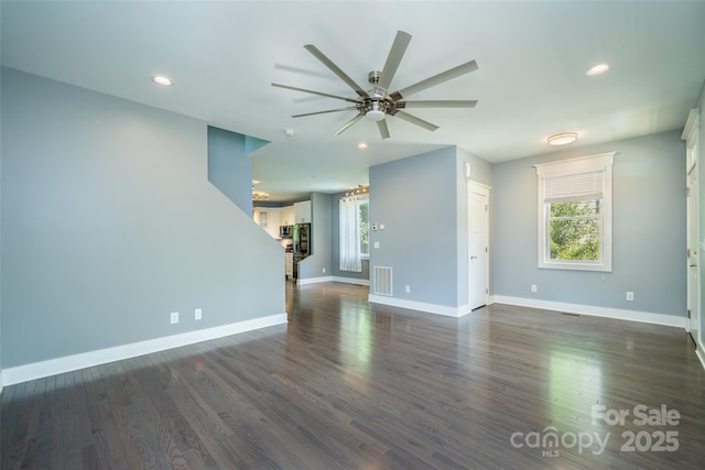 21 Bryant St, Asheville, NC 28806 - unfurnished living room with a ceiling fan, plenty of natural light, baseboards, dark wood-style floors, and recessed lighting