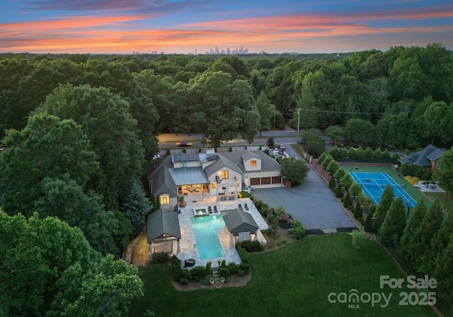 8300 Fairview Rd, Charlotte, NC 28226 - aerial view of property and surrounding area featuring a forest