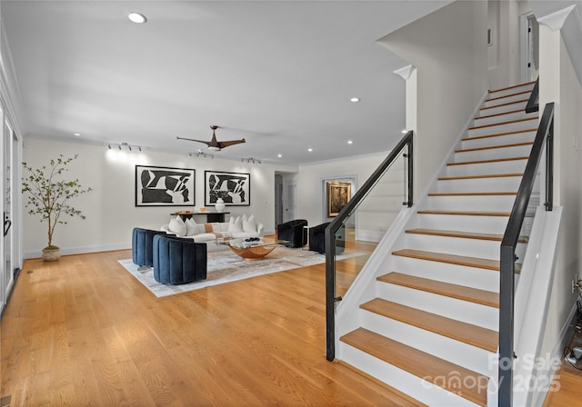 8300 Fairview Rd, Charlotte, NC 28226 - living room featuring stairway, ceiling fan, baseboards, recessed lighting, and light wood-style floors