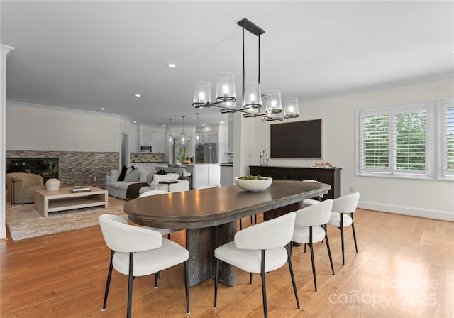 8300 Fairview Rd, Charlotte, NC 28226 - dining space featuring a chandelier, light wood-style floors, and recessed lighting