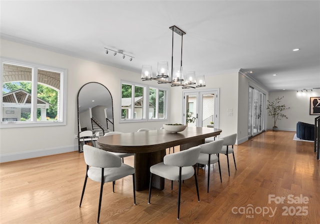 8300 Fairview Rd, Charlotte, NC 28226 - dining space featuring a chandelier, healthy amount of natural light, light wood-style floors, baseboards, and recessed lighting
