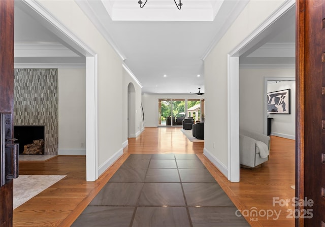 8300 Fairview Rd, Charlotte, NC 28226 - corridor with crown molding, wood finished floors, recessed lighting, baseboards, and arched walkways