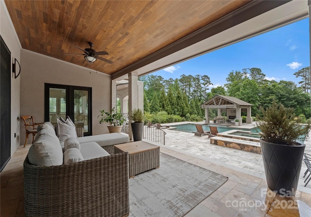 8300 Fairview Rd, Charlotte, NC 28226 - view of patio / terrace featuring a gazebo, an outdoor hangout area, a ceiling fan, and a pool with connected hot tub