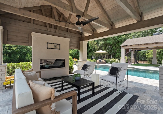 8300 Fairview Rd, Charlotte, NC 28226 - view of patio / terrace featuring a gazebo, an outdoor living space with a fireplace, a ceiling fan, and an outdoor pool