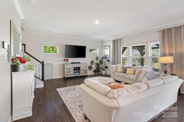 living area with ornamental molding, plenty of natural light, baseboards, dark wood-type flooring, and recessed lighting
