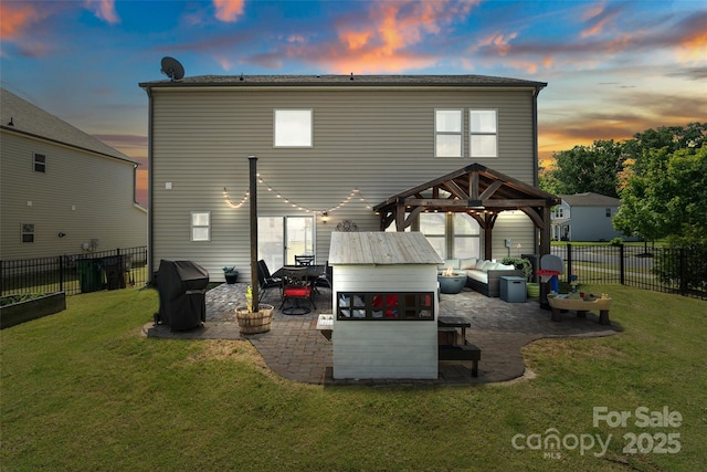 back of house with a gazebo, a patio, and outdoor lounge area