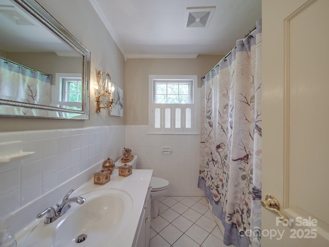 full bathroom with toilet, tile walls, visible vents, tile patterned flooring, and vanity