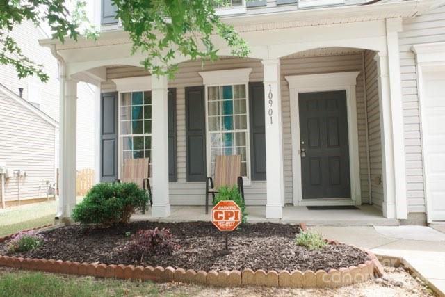 10901 Claude Freeman Dr, Charlotte, NC 28262 - doorway to property with a porch