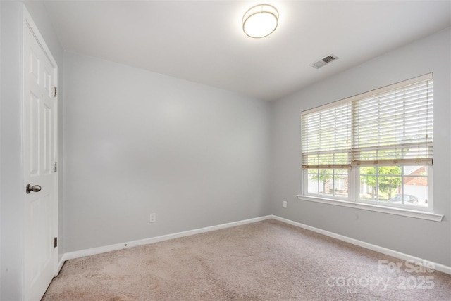 10901 Claude Freeman Dr, Charlotte, NC 28262 - carpeted empty room with baseboards
