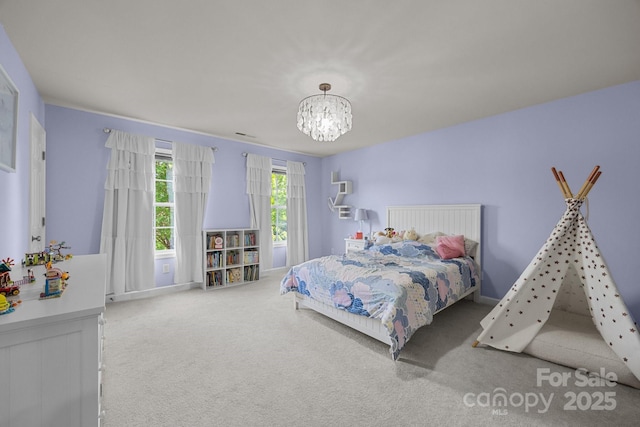 1108 Longwood Ct, Matthews, NC 28104 - bedroom featuring carpet flooring and a chandelier