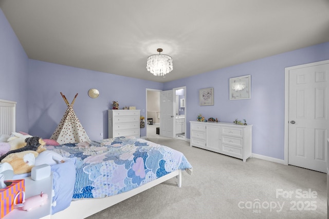 1108 Longwood Ct, Matthews, NC 28104 - bedroom featuring light carpet, a chandelier, baseboards, and connected bathroom