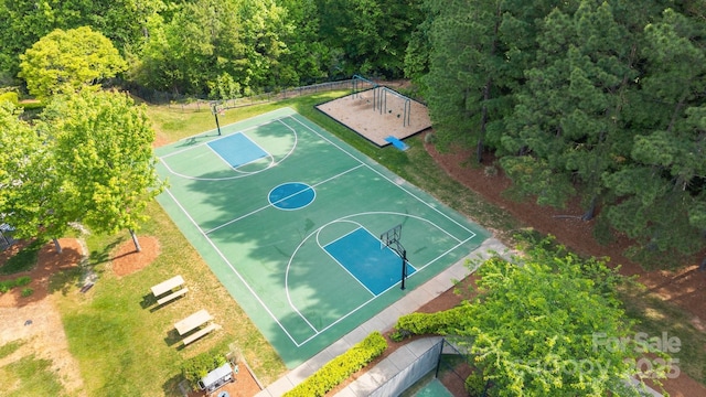 1108 Longwood Ct, Matthews, NC 28104 - view of sport court featuring community basketball court and a wooded view