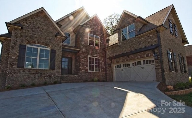 1921 Notchwood Ct, Clover, SC 29710 - view of front of house featuring an attached garage, brick siding, and driveway