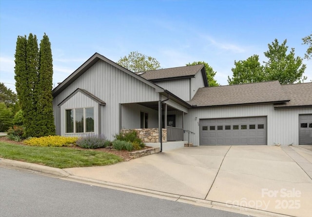 452 Kyfields, Weaverville, NC 28787 - view of front of house with a garage, driveway, and a shingled roof