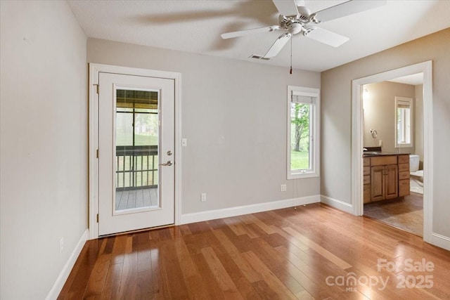 452 Kyfields, Weaverville, NC 28787 - doorway featuring light wood finished floors and baseboards