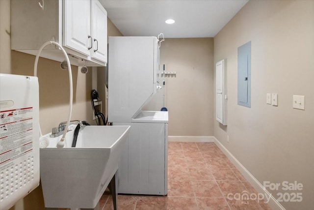 452 Kyfields, Weaverville, NC 28787 - laundry room featuring cabinet space, hookup for a washing machine, electric panel, water heater, and baseboards