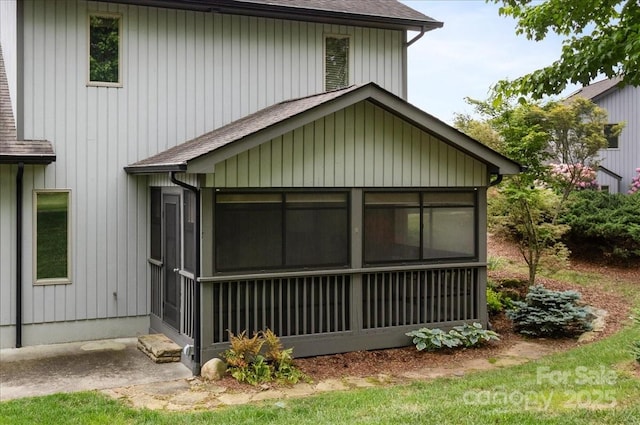 452 Kyfields, Weaverville, NC 28787 - view of home's exterior featuring a sunroom and a shingled roof