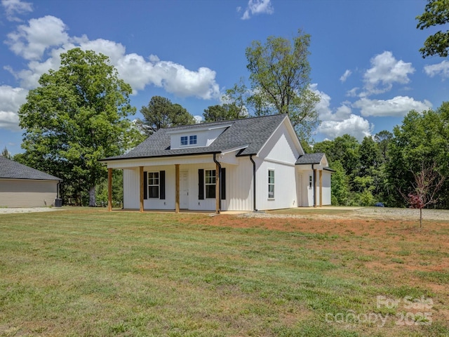 1454 King Rd, York, SC 29745 - modern farmhouse style home with a front yard, covered porch, and roof with shingles