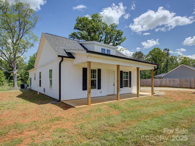 1454 King Rd, York, SC 29745 - modern farmhouse with cooling unit, a patio area, and a shingled roof