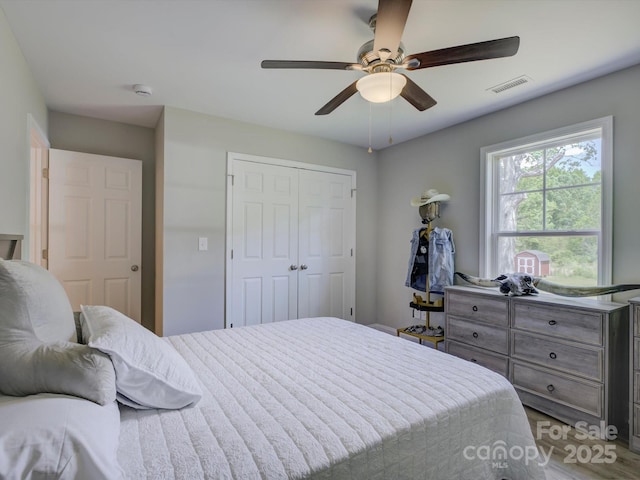 1454 King Rd, York, SC 29745 - bedroom featuring a closet, ceiling fan, and wood finished floors