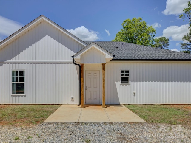 1454 King Rd, York, SC 29745 - modern farmhouse style home featuring roof with shingles, board and batten siding, and a patio area