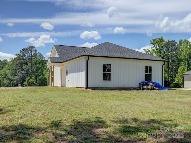 1454 King Rd, York, SC 29745 - view of property exterior with a lawn and roof with shingles