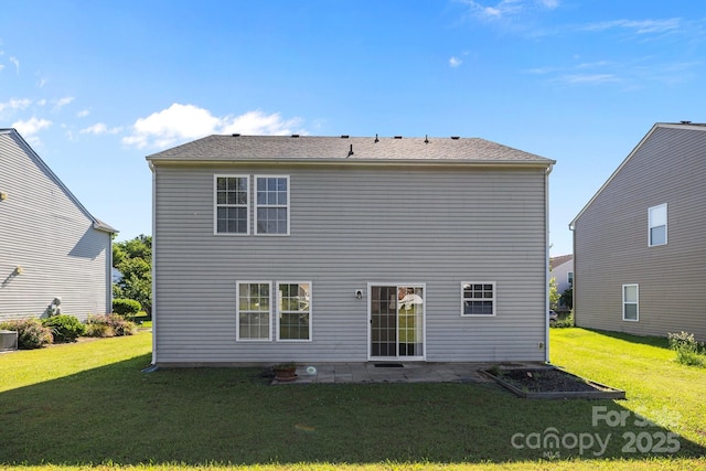 rear view of house with a yard, a patio, and cooling unit
