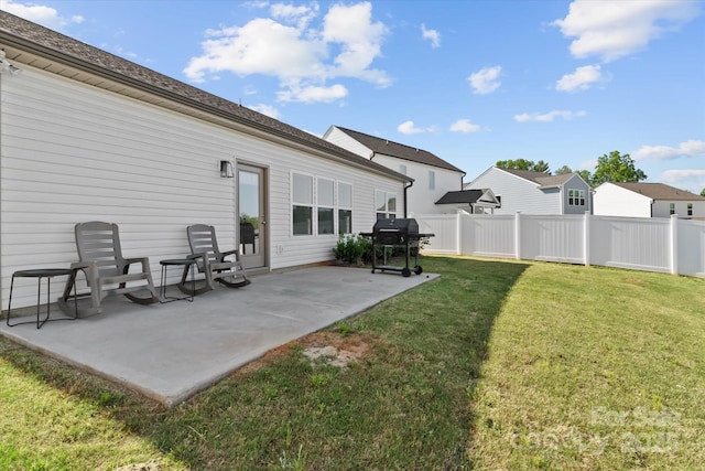 view of yard featuring a patio area and fence