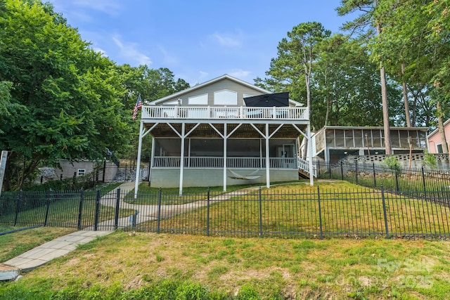 592 Shoreline Rd, New London, NC 28127 - rear view of property with a wooden deck, a sunroom, and stairs