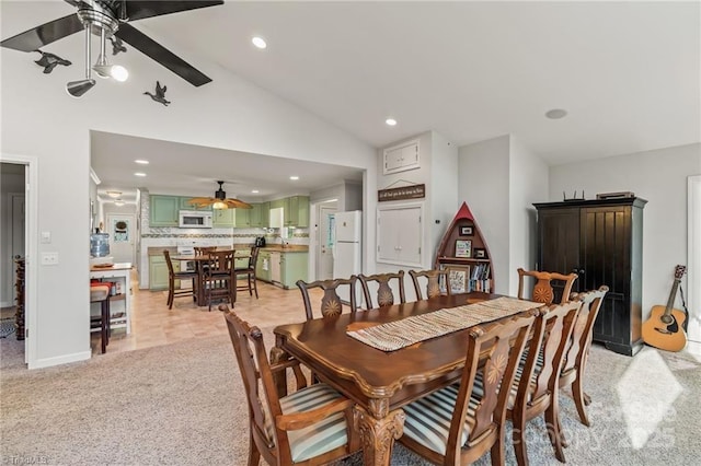 592 Shoreline Rd, New London, NC 28127 - dining space featuring a ceiling fan, lofted ceiling, light colored carpet, and recessed lighting