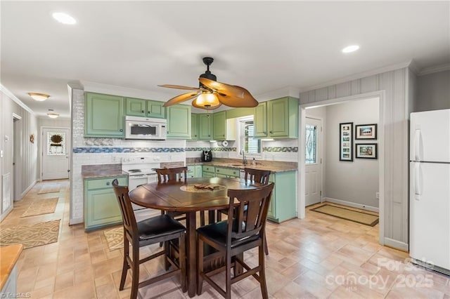 592 Shoreline Rd, New London, NC 28127 - dining space featuring ornamental molding, a ceiling fan, baseboards, and recessed lighting