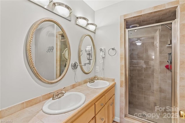 592 Shoreline Rd, New London, NC 28127 - full bathroom with a stall shower and double vanity