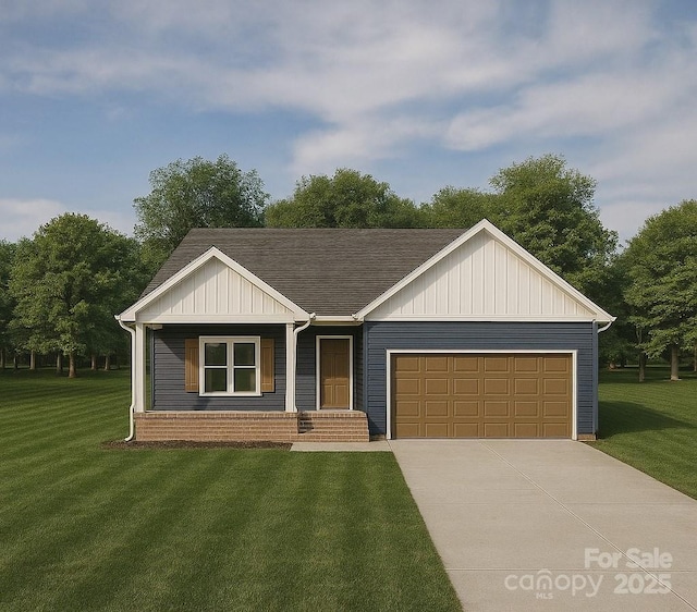 view of front of property with concrete driveway, a front yard, a garage, and board and batten siding