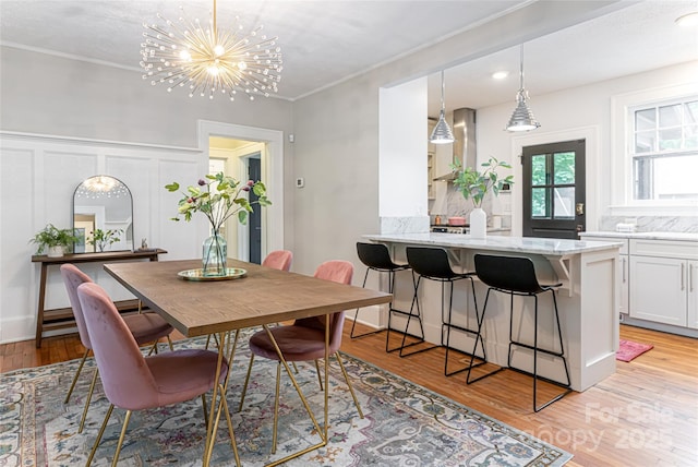 118 Macon Ave, Asheville, NC 28801 - dining room with ornamental molding, light wood-style floors, a chandelier, and recessed lighting