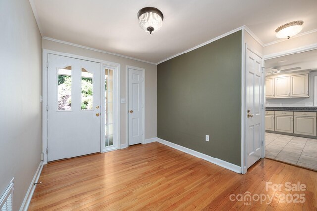 200 Allen Mountain Dr, Black Mountain, NC 28711 - foyer featuring ornamental molding, light wood-style floors, and baseboards